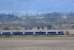 1612 Glasgow - Inverness train near Hilton Jn with the bow string viaduct over the River Earn on the ENR seen behind.<br><br>[Brian Forbes 22/03/2007]