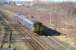 A Carlisle-Leeds train runs along the Settle & Carlisle line east from Petteril Bridge Junction parallel with the Newcastle & Carlisle route (other side of the scrub). Beyond the N&C lines is the cleared site of the NE London Road yard and shed, while off picture to the left stood the Midland's Durranhill shed and sidings.<br><br>[John Furnevel 26/02/2007]