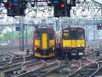 156455 and 314214 pass each other outside Glasgow Central<br><br>[Graham Morgan 02/05/2007]