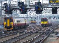 Class 156 and 314 units coming and going at Glasgow Central<br><br>[Graham Morgan 02/05/2007]