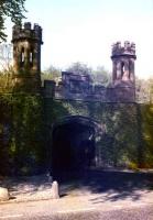 Guthrie Gate. The castellated bridge and gatehouse to the west of Guthrie station where the railway crossed the access road to the Guthrie estate. <br><br>[Craig Seath //1982]