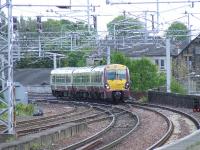 334003 crossing Wallneuk Junction at Paisley Gilmour Street with a service for Gourock<br><br>[Graham Morgan 22/05/2007]