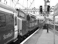37410 departs from Platform 9, bound for Polmadie, with the empty Caledonian Sleeper on 12 May.<br><br>[Graham Morgan 12/05/2007]