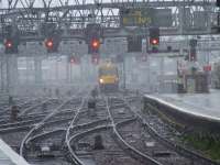 Coming through the rain, a Class 334 approaching Glasgow Central<br><br>[Graham Morgan 19/05/2007]