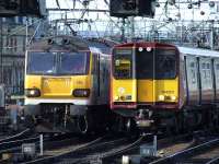 92026 and 314201 neck and neck as they both approach Glasgow Central<br><br>[Graham Morgan 28/05/2007]