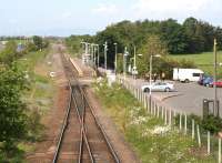 Looking towards Annan from Gretna and the start of the single line section on 30 May 2007. Some trackbed clearance has been carried out while on the right a <I>hit squad</I> has just arrived in the car park to undertake routine station cleaning and maintenance.<br><br>[John Furnevel 30/05/2007]