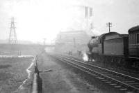 Empty coaches banked by Director Class 4-4-0 2680 <i>Lucy Ashton</i> on Cowlairs Incline in September 1948. On the front of the train is N15 0-6-2T 9127. [See image 15567]<br><br>[G H Robin collection by courtesy of the Mitchell Library, Glasgow 20/09/1948]