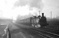 Empty coaches hauled by N15 0-6-2T 9127 and banked by Director Class 4-4-0 2680 <i>Lucy Ashton</i> ascending Cowlairs Incline on 20 September 1948. [See image 15566]<br><br>[G H Robin collection by courtesy of the Mitchell Library, Glasgow 20/09/1948]