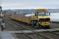 Unimog with ballast train in Montrose station.<br><br>[Duncan Ross 02/03/2007]