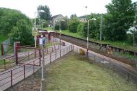 Entrance to Corkerhill station on the Paisley Canal line in May 2007. View east towards Corkerhill depot from where the electrified headshunt runs. The original 1896 G&SW <i>railway village</I> (demolished and cleared by 1971) stood to the right of the picture.<br><br>[John Furnevel 20/05/2007]