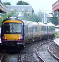 170396 at the rear of a two unit set with a Class 158 at the front departing Aviemore with the 1630 service for Inverness<br><br>[Graham Morgan 06/07/2007]