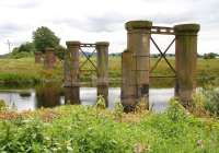 Remains of the bridge that carried the Blairgowrie branch over the River Isla north of Coupar Angus. Photographed on 12 July 2007 looking south.<br><br>[John Furnevel 12/07/2007]