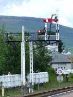 Semaphore signals, sidings and mile post marker at the North End of Aviemore Station<br><br>[Graham Morgan 06/07/2007]
