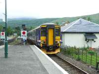 Scene at Crianlarich on 20 July 2007 as 156450 arrives from Oban to combine with 156496, which had arrived shortly beforehand from Fort William, before going on to Glasgow Queen St.<br><br>[John Gray 20/07/2007]