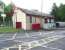 View from the car park at Giffnock towards the station building and northbound platform on 6 May 2007. <br><br>[John Furnevel 06/05/2007]