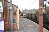 Coal train en route to Longannet on 17 May passing east through Saltcoats station.<br><br>[John Furnevel /05/2007]