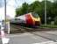 Voyager southbound over Floriston LC on 25 May.<br><br>[John McIntyre 25/05/2007]