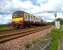 Helensburgh bound service approaching Craigendoran Junction around the sea wall on 28 May 2007.<br><br>[John McIntyre 28/05/2007]