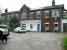 Forecourt of the former LNWR station at Builth Road on 2 June. The station entrance is on the far right via a covered passageway. <br><br>[John McIntyre 2/06/2007]