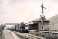 NBR 4.4.0 62441 <i>Black Duncan</i> passing Tillicoultry on Dunfermline - Dollar Special. [Railscot note: this was originally the terminus of a short S&DR branch.]<br><br>[G H Robin collection by courtesy of the Mitchell Library, Glasgow 16/06/1951]