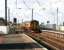 Train from Glasgow Central runs over the crossing into Kirknewton station in March 2007 on its journey to Waverley. <br><br>[John Furnevel 05/03/2007]