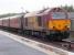 Caroustie to Edinburgh 2007 open golf special with 67003 leading passing Ladybank during a prolonged storm.<br><br>[Brian Forbes 21/07/2007]