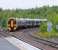 1712 all stations from Edinburgh to Carnoustie pulls away from Ladybank on 21/07/07. Heavy rain distortion of image!<br><br>[Brian Forbes 21/07/2007]