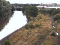 View west along the banks of the River Leven on 26 July 2007 showing the rusting and overgrown lines that once brought the coal into the docks at Methil.<br><br>[John Furnevel 26/07/2007]