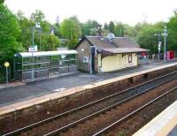 Contrasting platform buildings - view southeast at Busby on 6 May 2007.<br><br>[John Furnevel /05/2007]