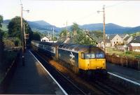 Late evening light bathes 47531 entering Blair Atholl from the south.<br><br>[Ewan Crawford //1989]