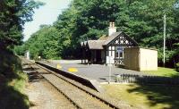 The second station building at Dunrobin looking north. The little shed in the distance to the right of the railway was used to hold the Dukes carriage. The shed has since been demolished, but the disused bay platform at the north end remains.<br><br>[Ewan Crawford //1989]
