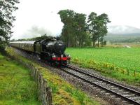 61994 is pictured about two miles north of Kingussie and it is raining.<br><br>[John Gray 18/08/2007]