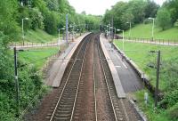 View east over a leafy Dumbreck station on 20 May 2007. The only double-track station on the Paisley Canal branch. The catenary runs as far as Corkerhill depot. [Additional: The Canal branch was electrified throughout in November 2012]<br><br>[John Furnevel 20/5/2007]
