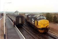 A class 37 draws in the Thurso portion before backing onto the Wick portion at Georgemas Junction.<br><br>[Ewan Crawford 04/01/1989]