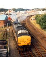 Oil train leaves the sidings at Oban.<br><br>[Ewan Crawford //1989]