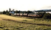 Oil train running east from Connel Ferry with the Ballachulish Branch viaduct in the background left.<br><br>[Ewan Crawford //1989]