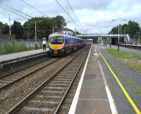 185148 stops at the down slow platform at Leyland on 25 August with a service to Blackpoool North.<br><br>[John McIntyre 25/8/2007]