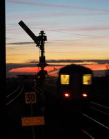 Westbound train heads west from Barnetby station towards Wrawby Junction.<br><br>[Ewan Crawford //2004]