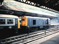 20208 couples up to a failed DMU at Waverley in August 1986. The class 20 hauled the train to Cardenden. <br><br>[David Panton /08/1986]