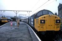 Class 37 with <I>The Royal Scotsman</I> at Dumbarton Central in 1985.<br><br>[John McIntyre //1985]