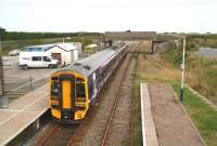 View east from the footbridge at Georgemas Junction on 28 August with an afternoon train preparing to leave for the south.<br><br>[John Furnevel /8/2007]
