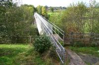 Not as precarious as it might look! View west over the former Drymen Viaduct on 11 October showing the walkway atop the water supply pipeline that has replaced the deck.<br><br>[John Furnevel 11/10/2007]