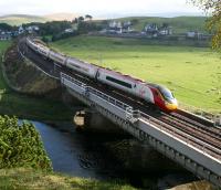 A Euston - Glasgow Central Pendolino catches the afternoon sun on Crawford Viaduct on 19 October 2007.<br><br>[John Furnevel 19/10/2007]