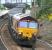 66138 heads west through Polmont on 7 August with Longannet - Hunterston empties.  <br><br>[John Furnevel 7/08/2007]