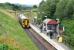 Looking west towards Bathgate as a train for Waverley pulls into the cramped station at Livingston North on 10 August 2007.<br><br>[John Furnevel 10/08/2007]