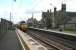 HST speeds south through Chathill and over the crossing on 16 August 2007. Note the old stone signal box still stands.<br><br>[John Furnevel 16/08/2007]