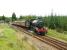 61994 accelerates away from Tulloch. Crossing Rannoch Moor has not done the floral wreath any good and its battered remains hang from the smokebox door.<br><br>[John Gray 01/09/2007]