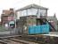 The level crossing and box at Chathill on 16 August 2007. The impressive building in the background with the portico entrance is the village post office. <br><br>[John Furnevel 16/08/2007]