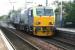 Network Rail RHTT unit DR98958, specialising in the removal of leaves and oil residues, heading out of Edinburgh through Wester Hailes station with all systems operational on 4 October 2007. Possibly a releaf working... (sorry)<br><br>[John Furnevel 04/10/2007]