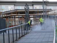 New Alloa station developing. The man & boy scupture is at the top of the ramp leading up to the framework of the new station building. The workers are paving the concourse.<br><br>[Brian Forbes 11/11/2007]